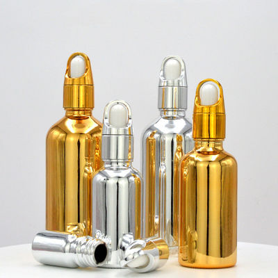 Customized Accepted Essential Oil Small Round Empty Shiny Silver Gold Dropper Oil Bottle with Unique Flower Basket Rubber