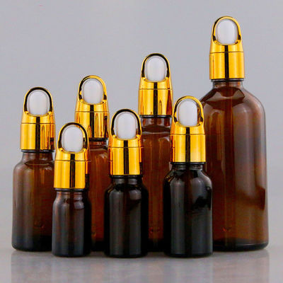 Customized Accepted Essential Oil Small Round Empty Shiny Silver Gold Dropper Oil Bottle with Unique Flower Basket Rubber