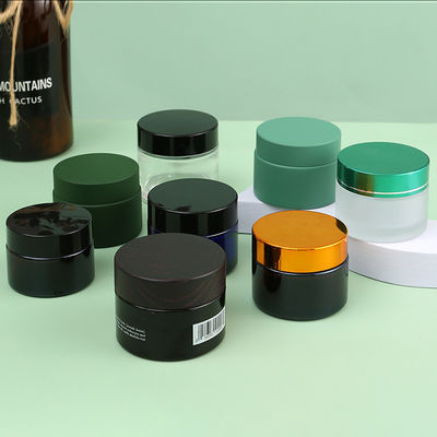 Customized Colors Matte Black Soft Touch Blue Green Amber Glass Cream Jar With Gold Black Sliver Aluminium Cap 5g 10g 15g 30g 50g 100g